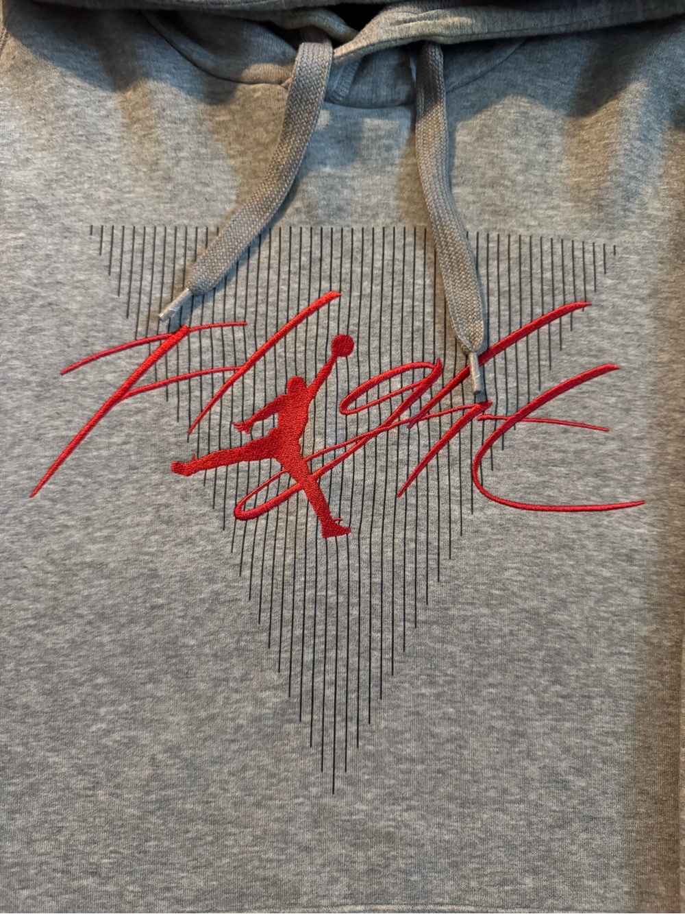 Jordan Gray Hoodie with Red Jumpman and Black Stripe Graphic